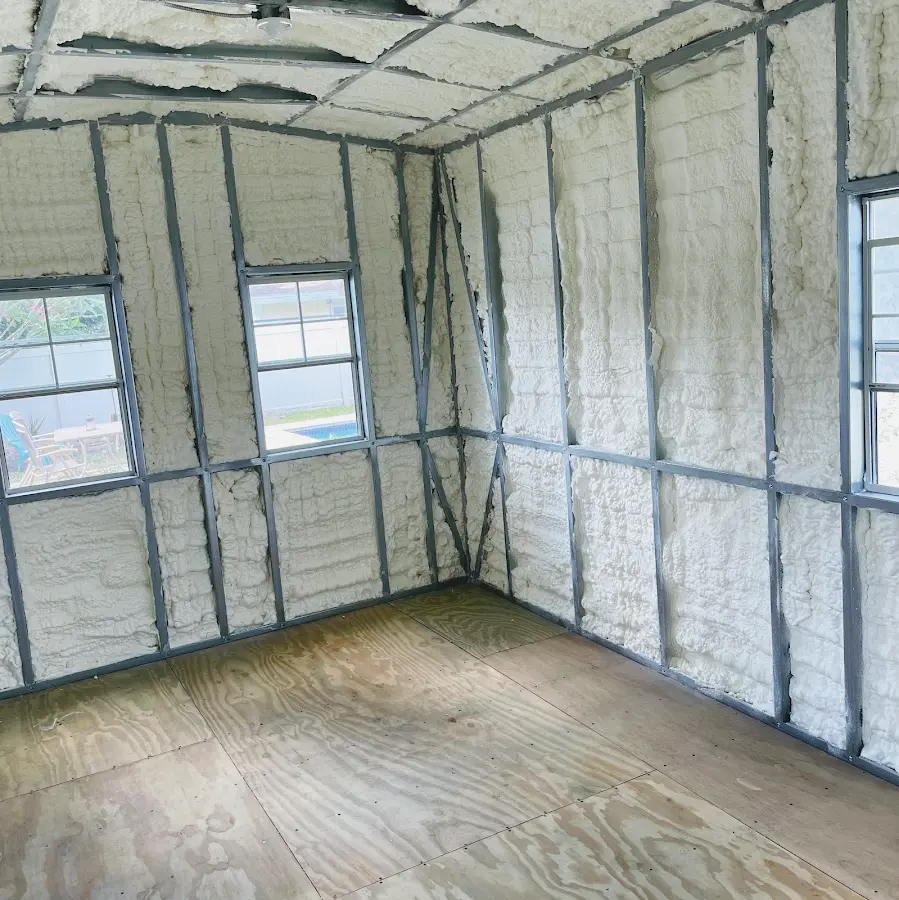 Closed-cell spray foam insulation applied to wall cavities in a residential project in Show Low